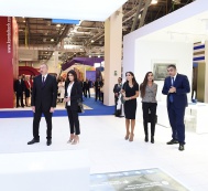President Ilham Aliyev and family members become familiarized with the Bakutel-2018 Exhibition 
