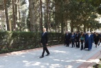 President Ilham Aliyev and family members pay a visit to the grave of national leader Heydar Aliyev at the Alley of Honour