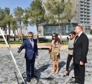 President Ilham Aliyev and family members attend the opening of a new park complex in Khatai District 